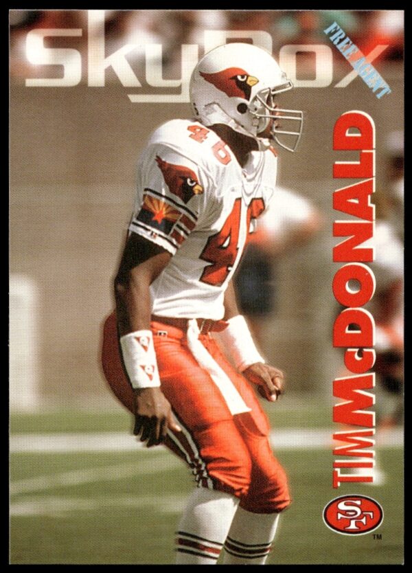 1993 SkyBox Impact Tim McDonald NFL Card #294, dynamic action shot, vibrant design.