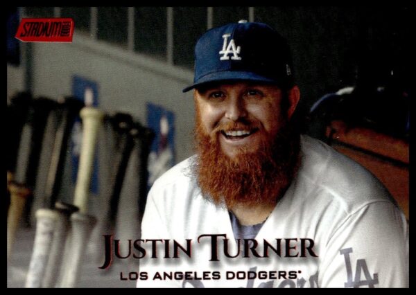 Justin Turner Dodgers card, red foil edition, smiling in dugout with red beard.