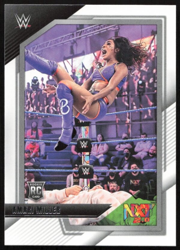 WWE trading card: Amari Millers top turnbuckle dive in purple-lit arena.