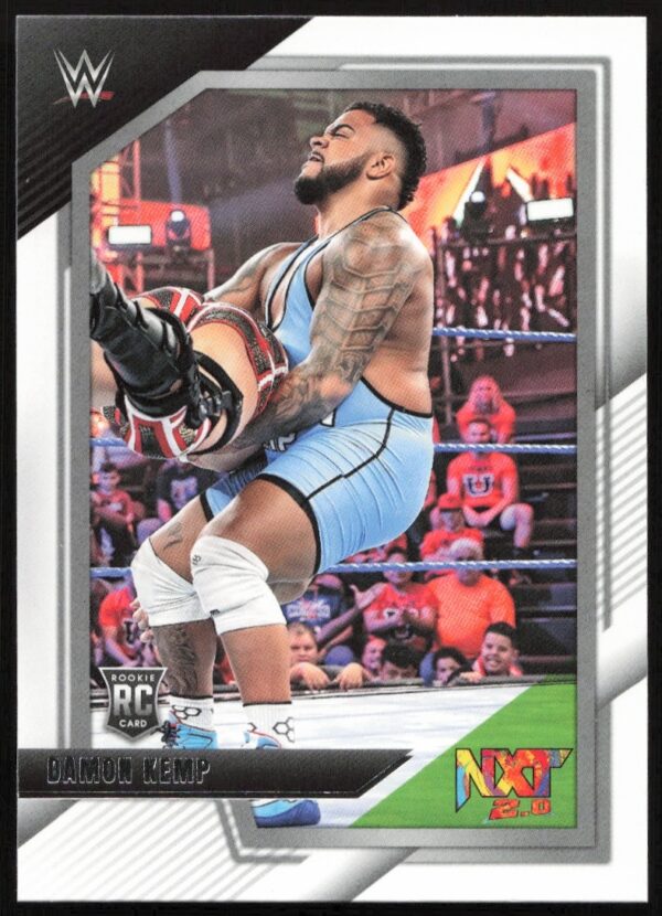 Damon Kemp in action on WWE NXT trading card, wearing light blue attire.