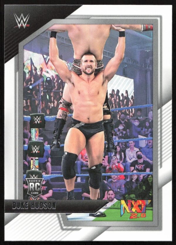 WWEs Duke Hudson celebrates victory in black trunks on 2022 Panini NXT 2.0 trading card.