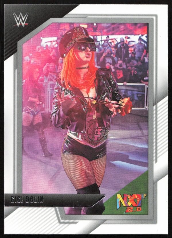 Gigi Dolins dramatic NXT entrance, showcasing vibrant style and theatrical presence in WWE trading card.
