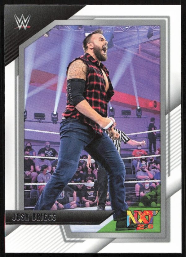 2022 WWE NXT Josh Briggs trading card in wrestling ring, dynamic pose, plaid shirt.