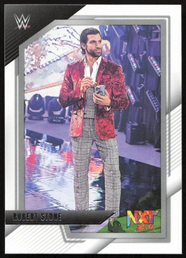 Robert Stone NXT Champion trading card, featuring bold outfit and championship belt, 2022 collection.