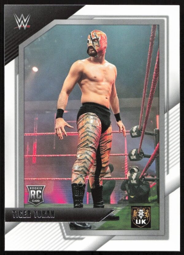 WWE Tiger Turan Rookie Card: Vivid luchador mask, colorful pants, dynamic ring action.