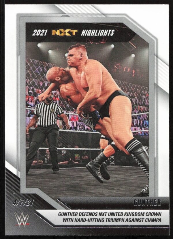 2021 NXT Highlights card featuring an intense wrestling moment with fans and referee visible.