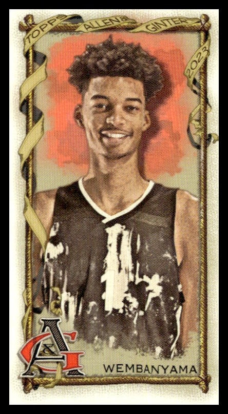 Vintage Victor Wembanyama basketball card with distressed style and decorative border, 2023 Topps series.