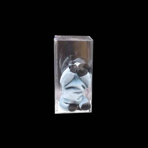 Collectible figurine in a glass case, stylish display, museum quality, artistic design.