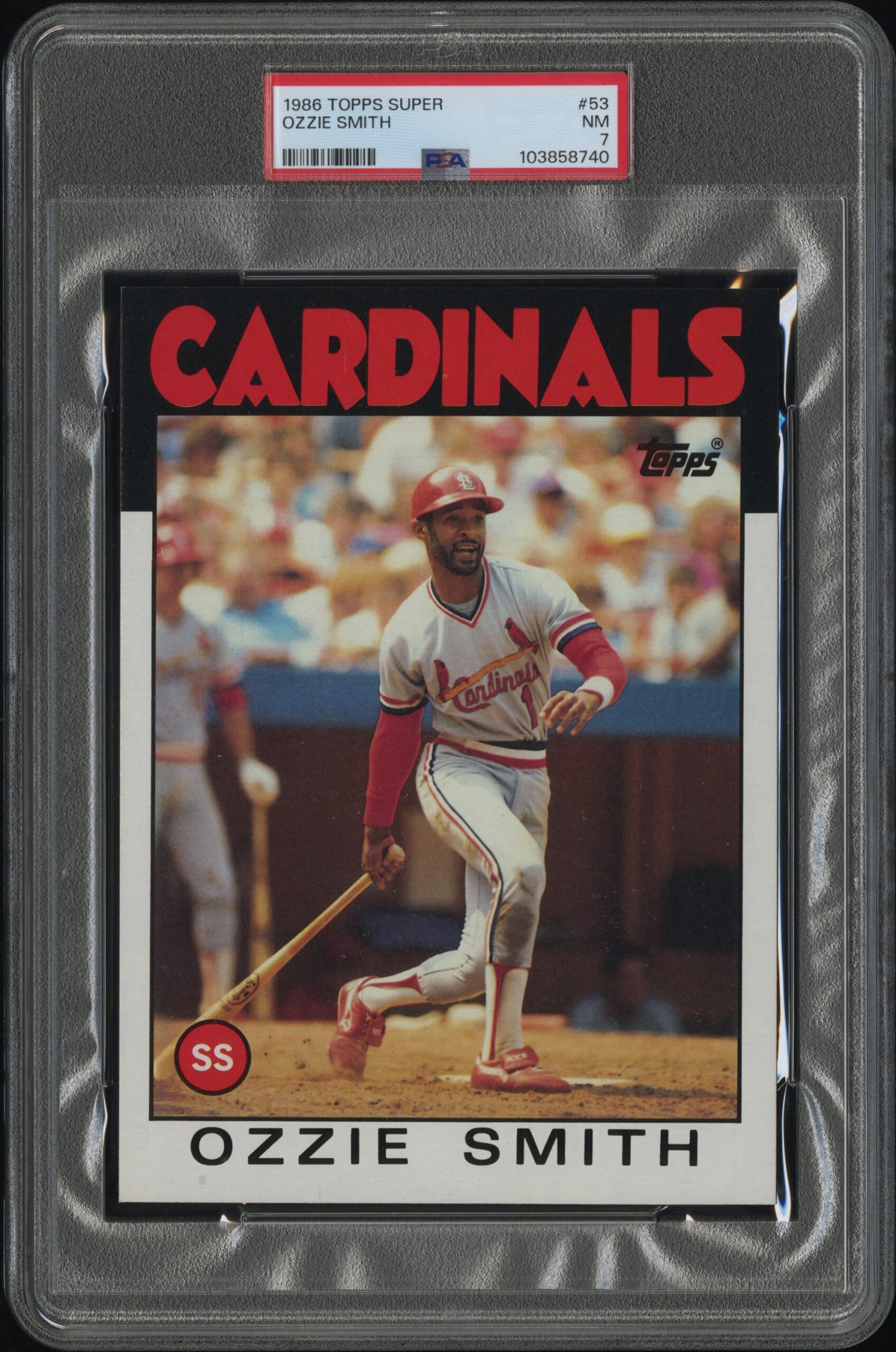 1986 Ozzie Smith Topps Super Card, PSA 7, featuring baseball legend in action.
