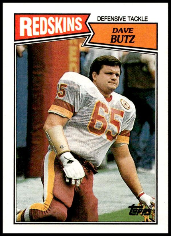 1987 Topps Dave Butz football card #75, showcasing vintage NFL action pose.