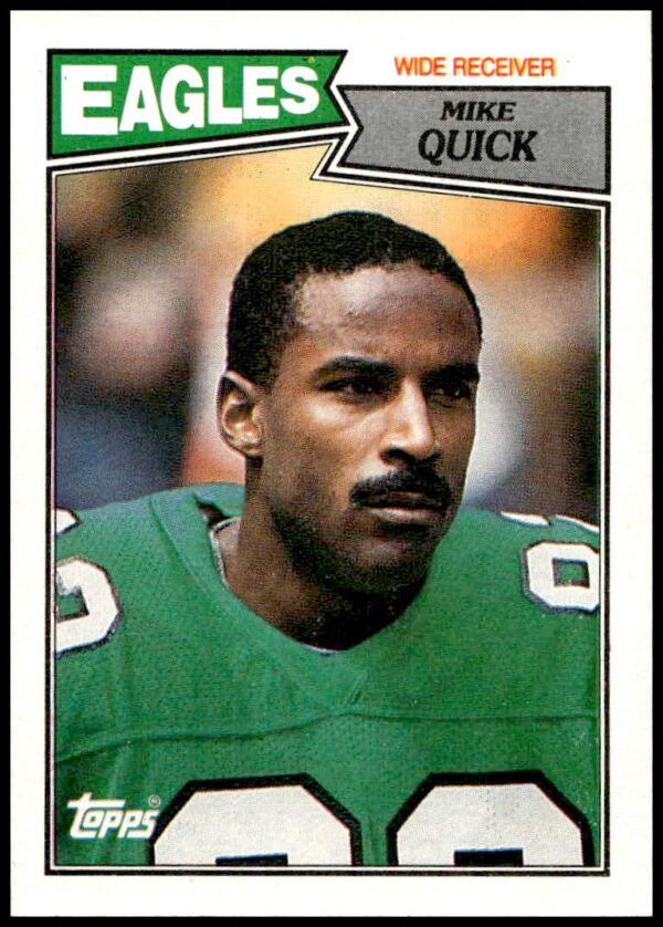 Mike Quick 1987 Topps football card #298 featuring Eagles wide receiver in action.