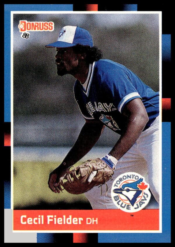 Cecil Fielder 1988 Donruss Baseball Card #565 in Blue Jays uniform, vibrant design.