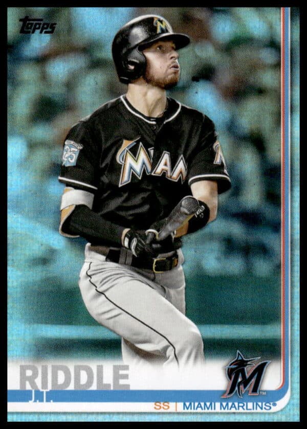 Front view of J.T. Riddles 2019 Topps Rainbow Foil card, number 607, with vibrant effects.