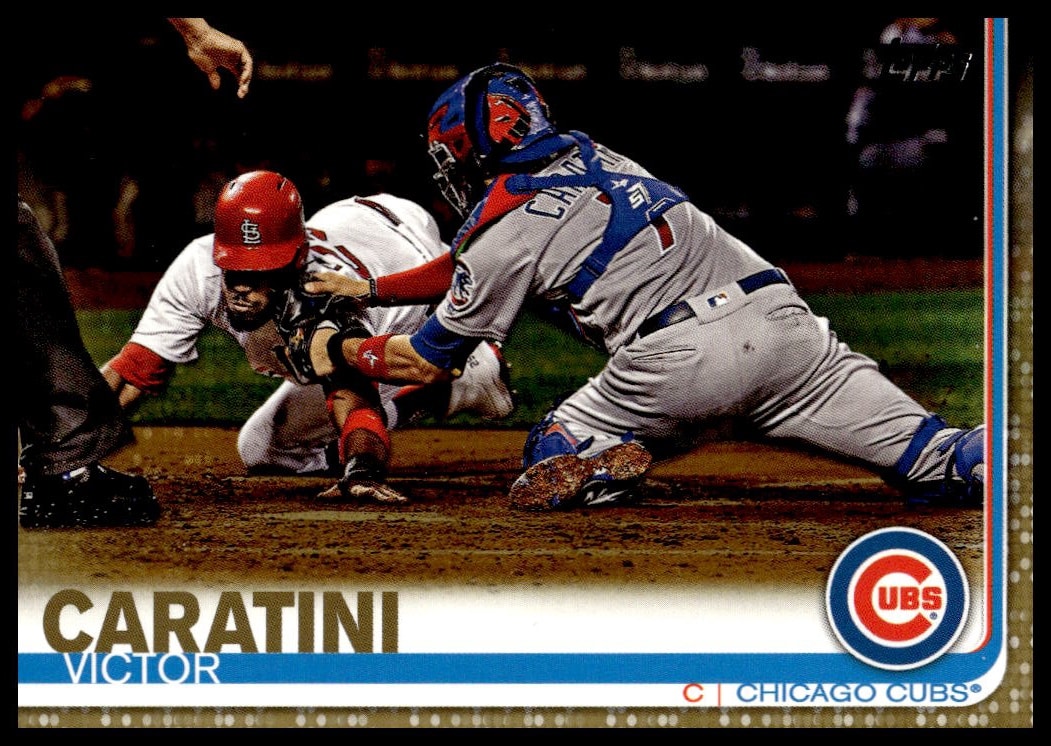 Victor Caratini 2019 Topps Gold card #389, Chicago Cubs, action pose.