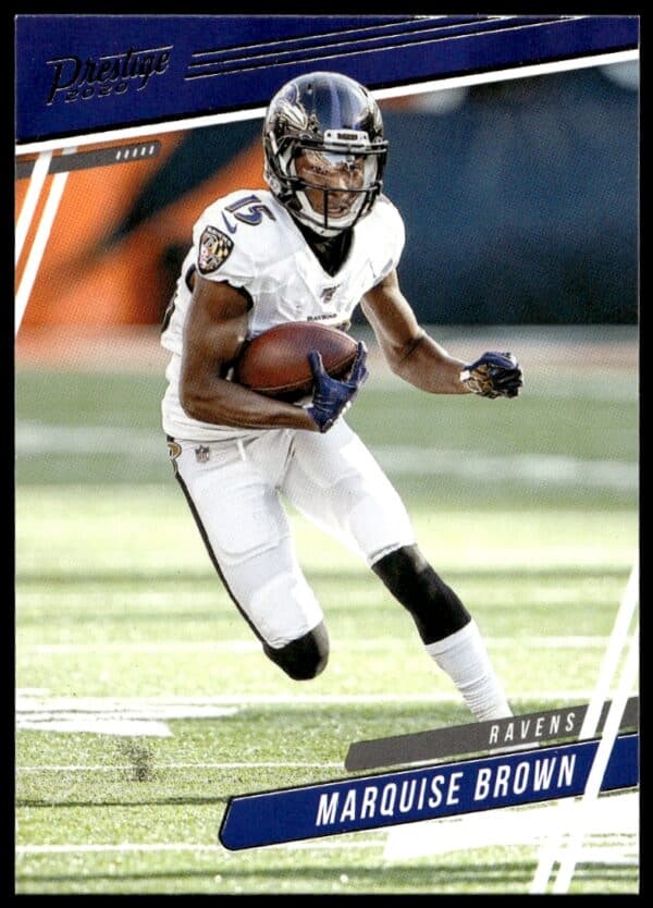 Marquise Brown 2020 Panini Prestige #155, Baltimore Ravens uniform, dynamic football pose.