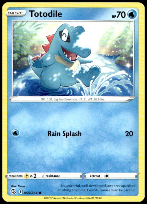 Totodile Pokémon Fusion Strike Card 2021, #055/264, showcases vibrant art and playful energy.