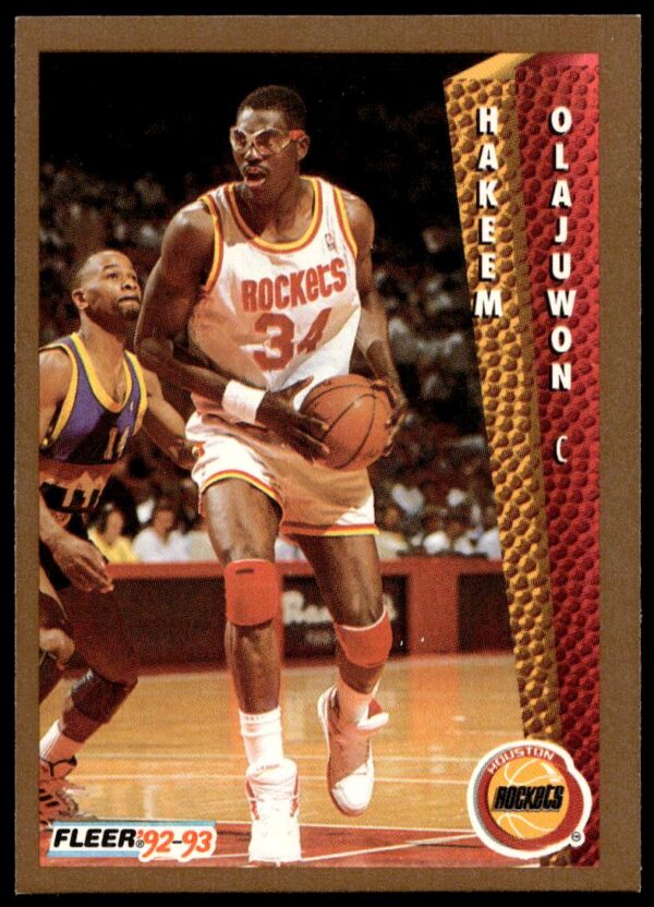 Hakeem Olajuwon 1992-93 Fleer basketball card #19, featuring him in Houston Rockets uniform.