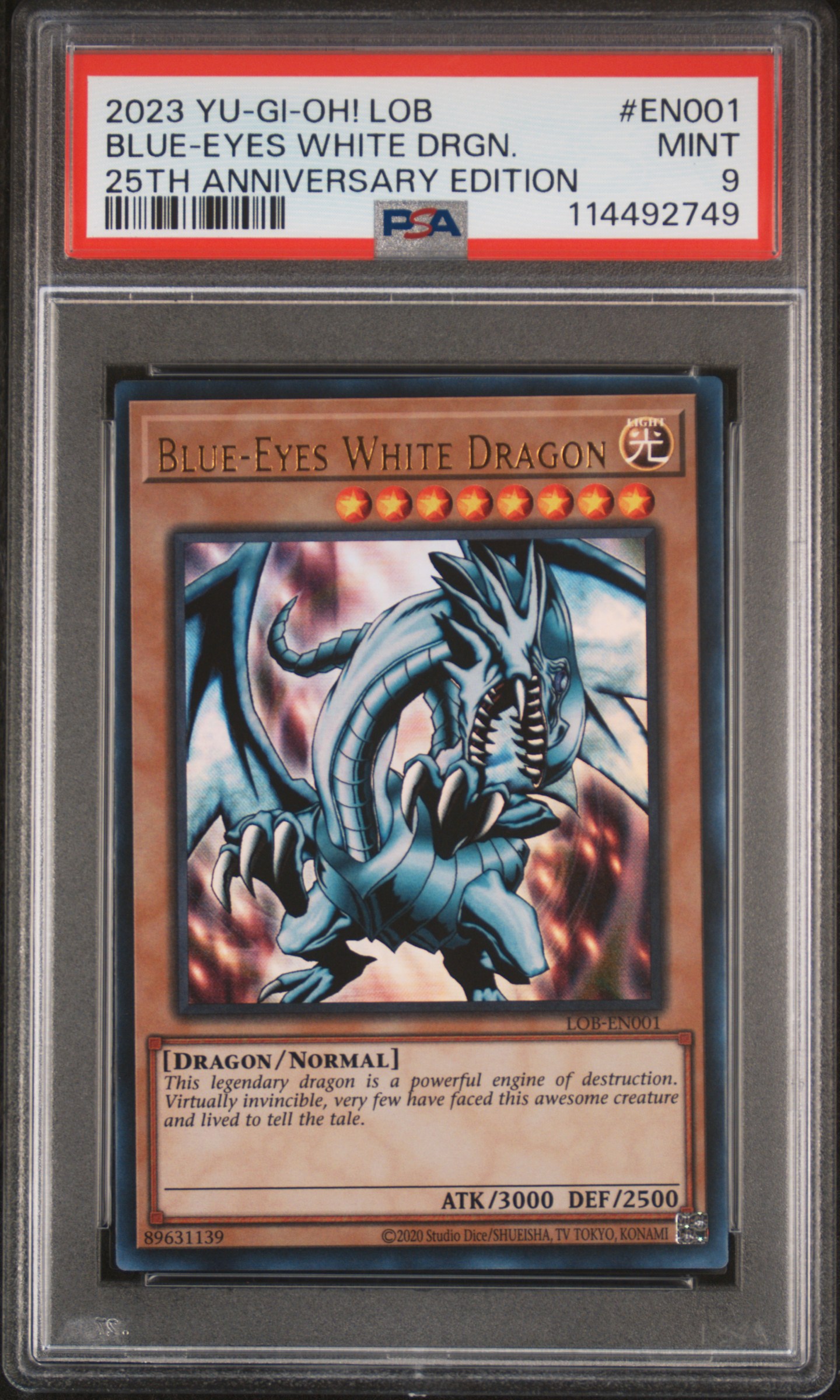 Yu-Gi-Oh! 25th Anniversary Blue-Eyes White Dragon Card PSA 9, Iconic Artwork.